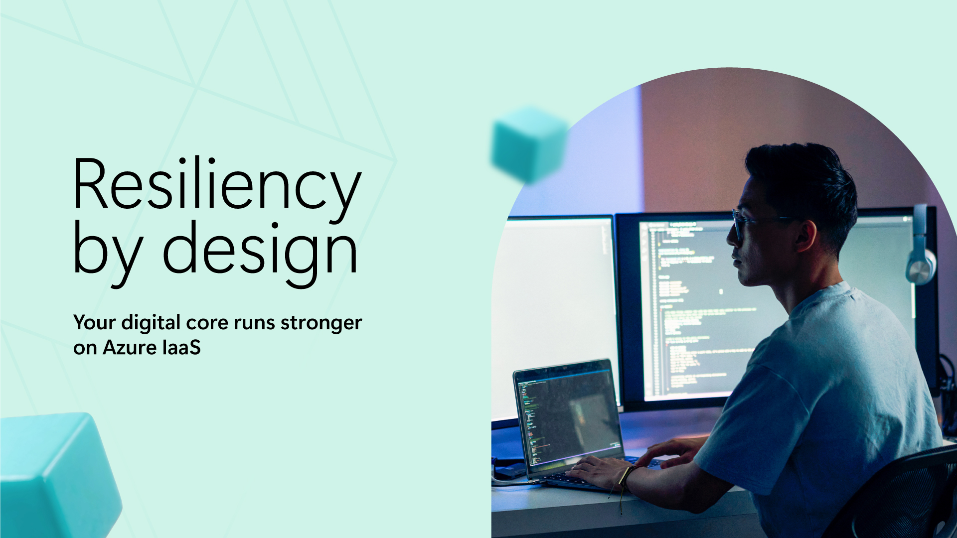 Developer working at desk.  Resiliency by design. Your digital core runs stronger on Azure Iaas